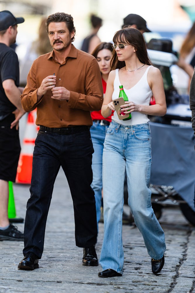 Pedro Pascal (L) and Dakota Johnson are seen filming "Materialists" in Tribeca on May 08, 2024 in Ne...
