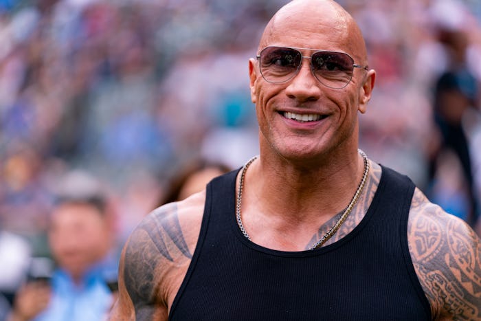 ARLINGTON, TX - MARCH 30: UFL Owner Dwayne Johnson ,The Rock, walks on the field before an UFL game ...