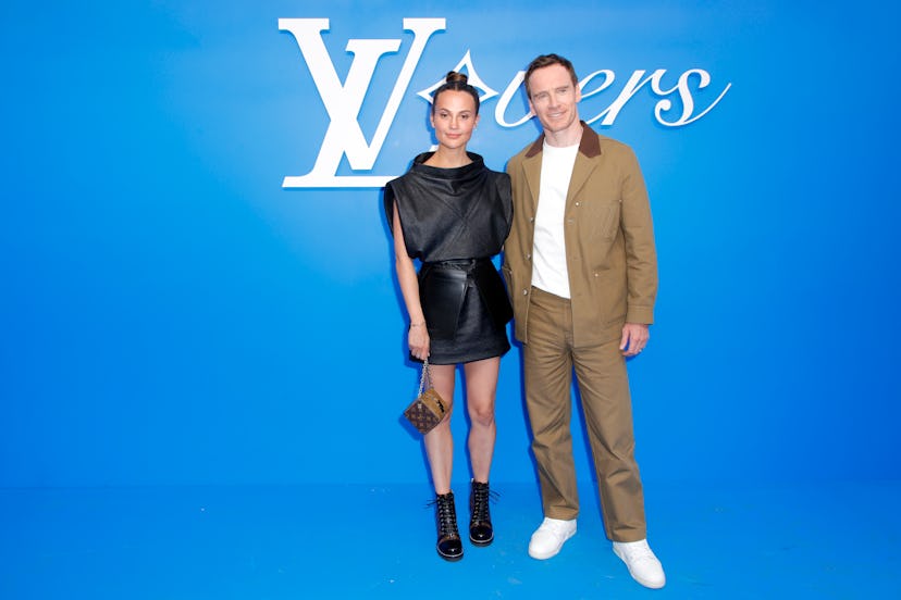 Alicia Vikander and Michael Fassbender attend the Louis Vuitton Menswear Spring/Summer 2025 show as ...
