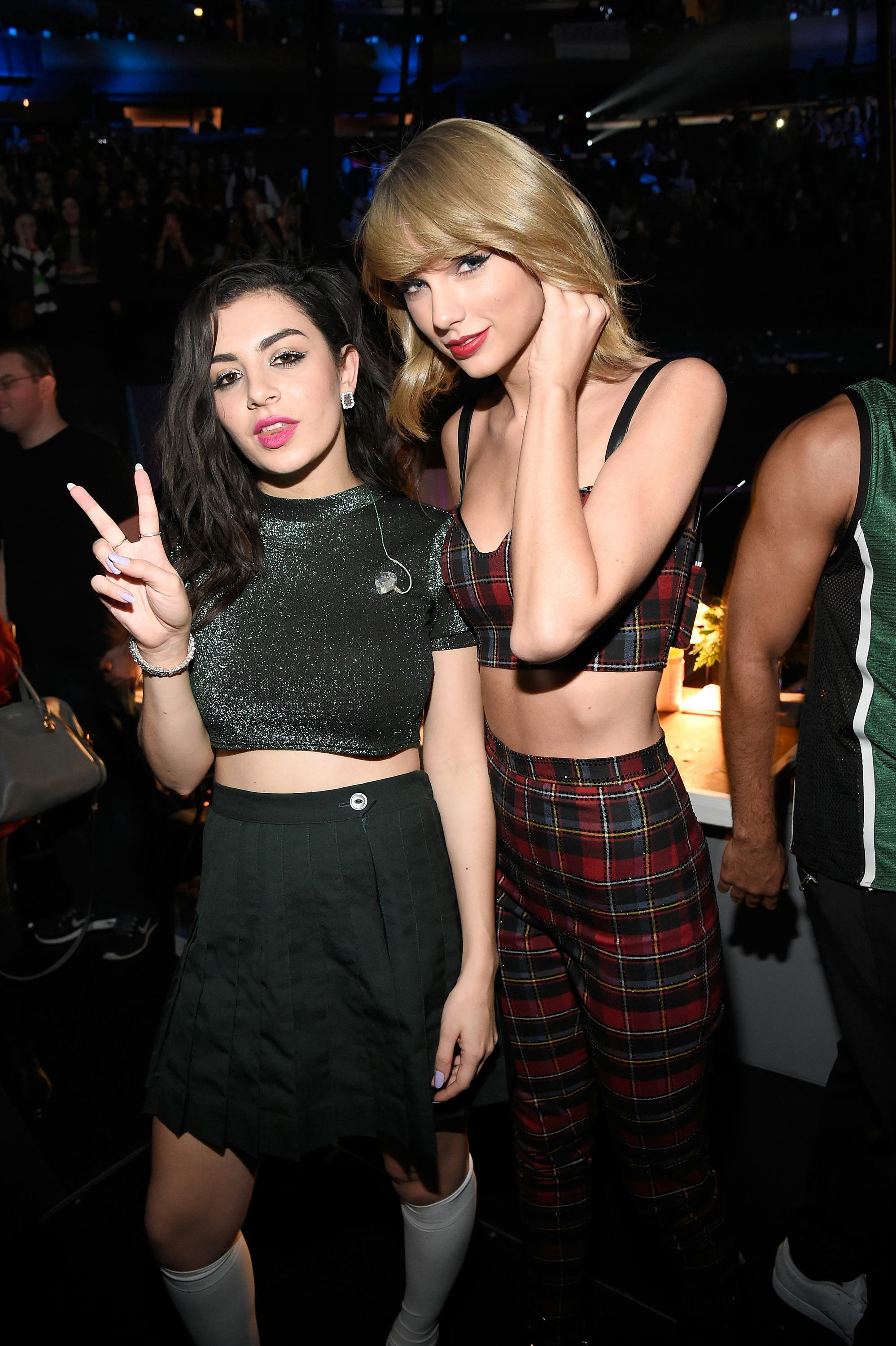 Charli XCX and Taylor Swift pose backstage