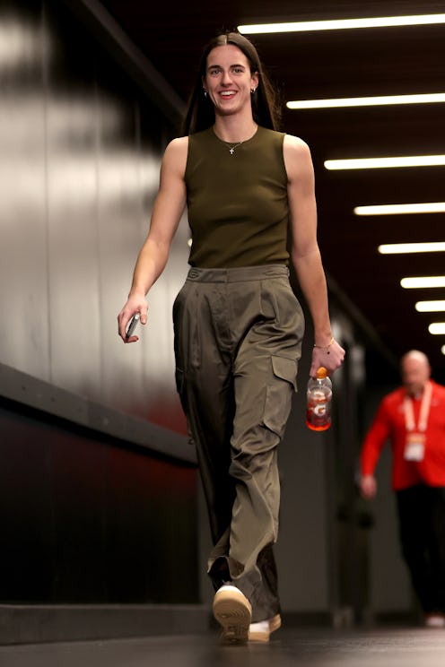Caitlin Clark's outfit to the Indiana Fever vs. Chicago Sky game was a Prada Canadian tuxedo.