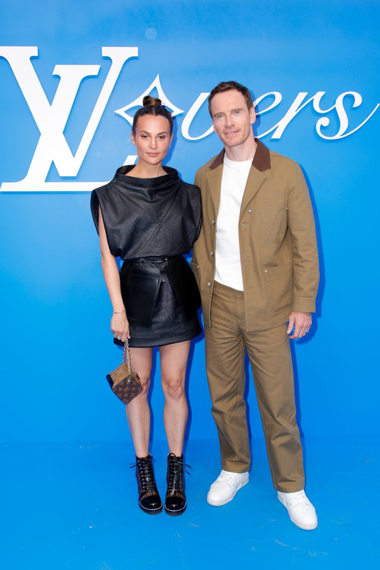 Alicia Vikander and Michael Fassbender attend the Louis Vuitton Menswear Spring/Summer 2025 show as ...