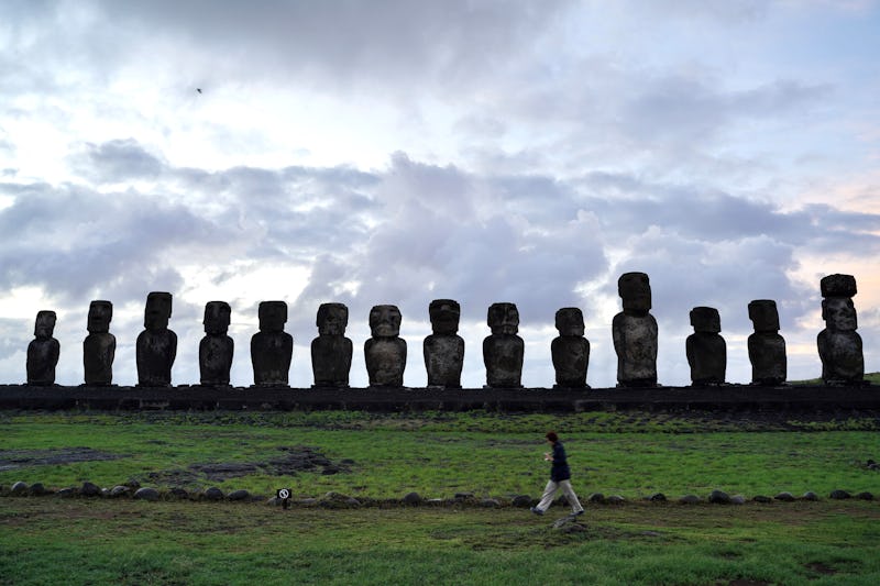 This photo taken on April 5, 2024 shows Moai stone statues on Easter island of Chile. Easter Island,...