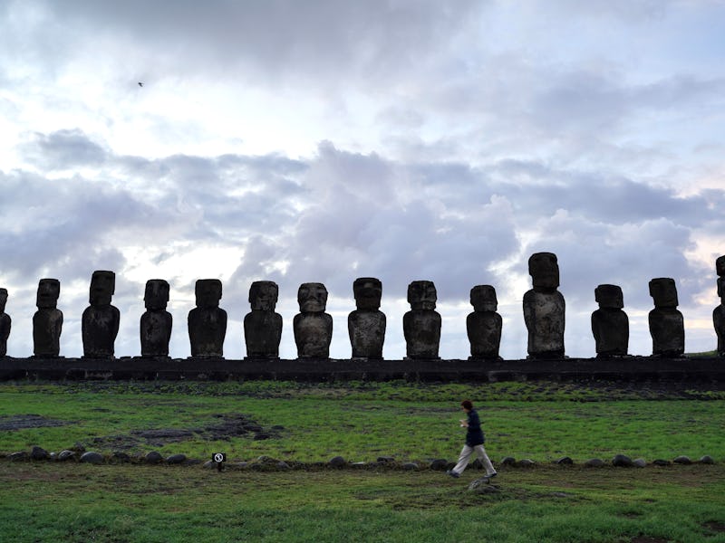 This photo taken on April 5, 2024 shows Moai stone statues on Easter island of Chile. Easter Island,...