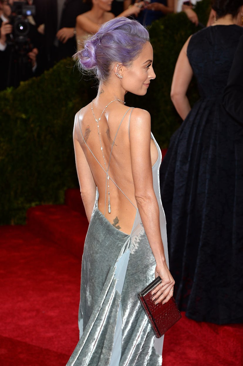 Nicole Richie has an iconic lower back tattoo.