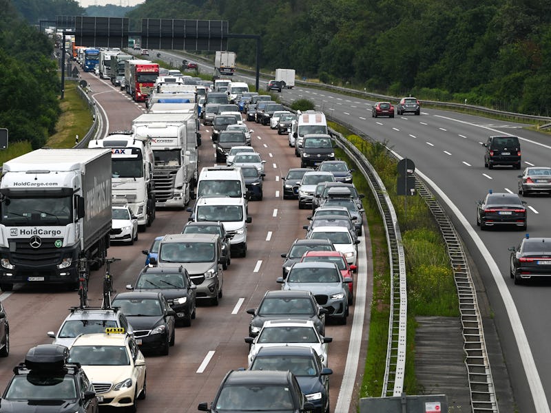 21 June 2024, Saxony-Anhalt, Vockerode: Traffic jam on the A9 near Vockerode. The summer vacations h...