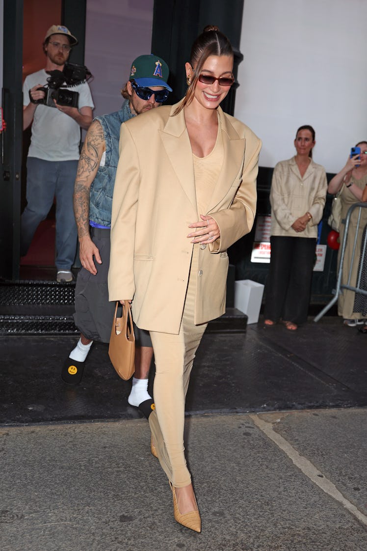 Hailey Bieber and Justin Bieber are seen together leaving her 'Rhode' pop up on June 23, 2024 in New...