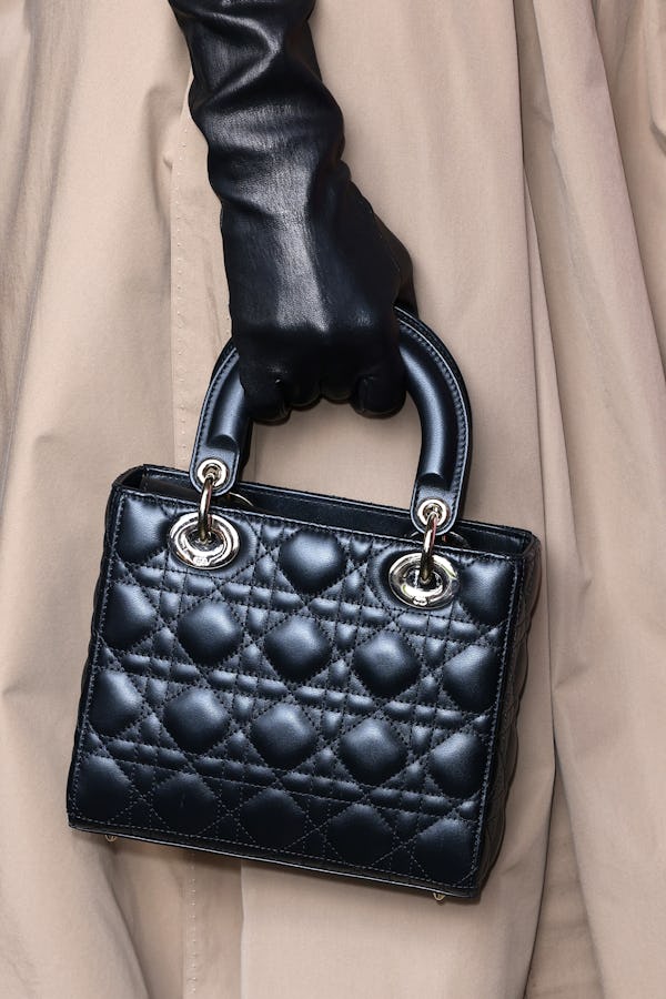 PARIS, FRANCE - JUNE 24: Jennifer Lopez (bag detail) attends the Christian Dior Haute Couture Fall/W...