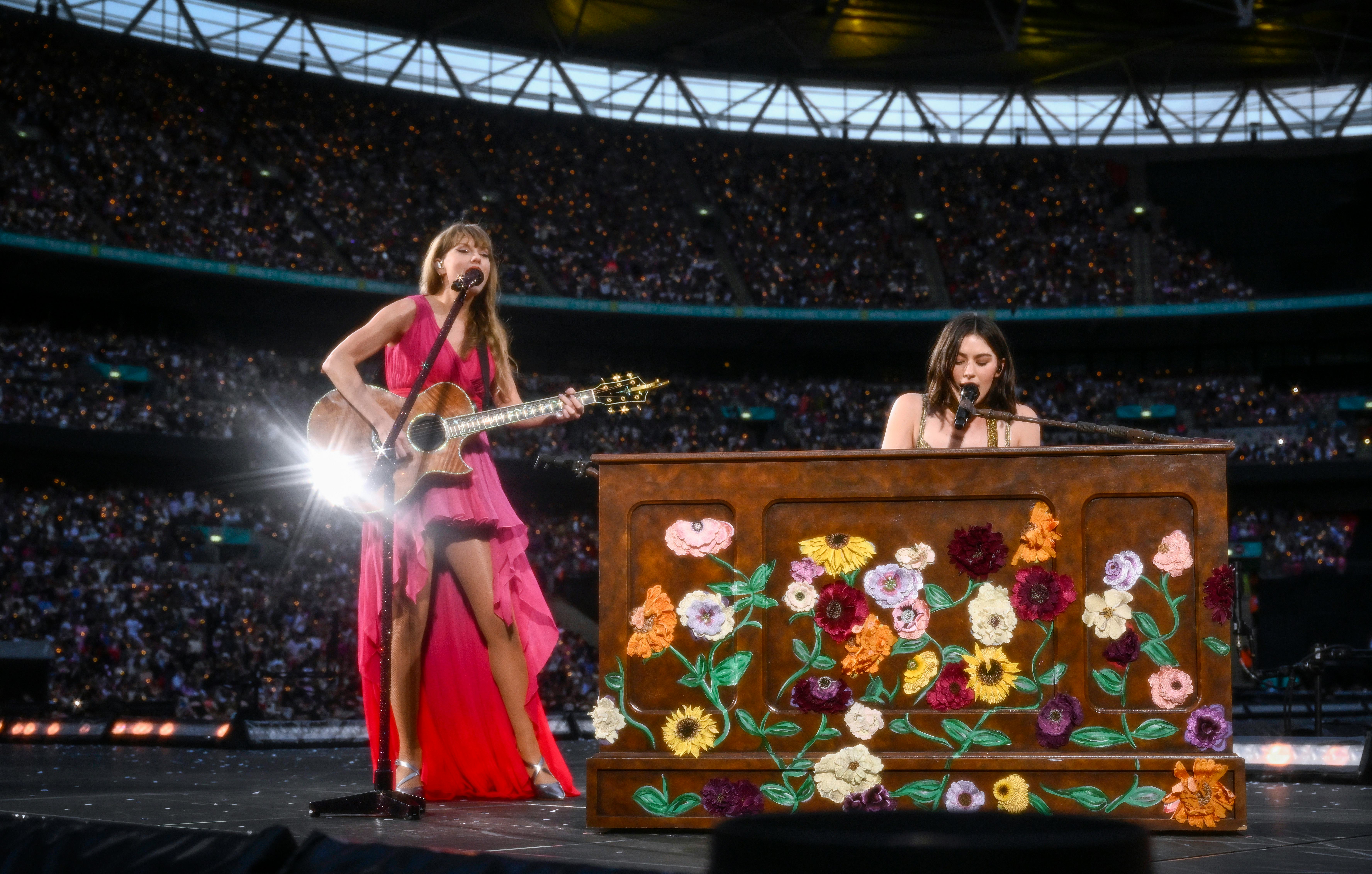 Taylor Swift and Gracie Abrams perform on stage