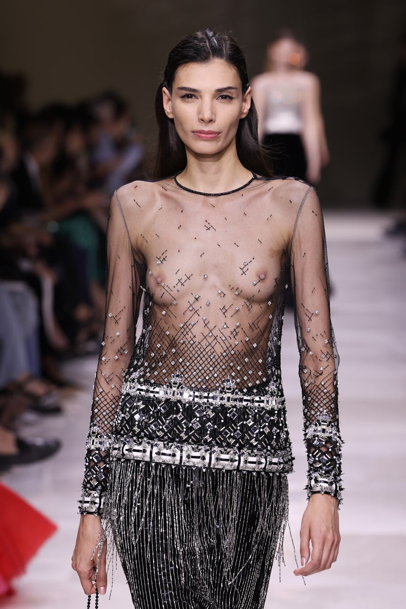 A model walks the runway during the Giorgio Armani Privé Haute Couture Fall/Winter 2024-2025 show as…