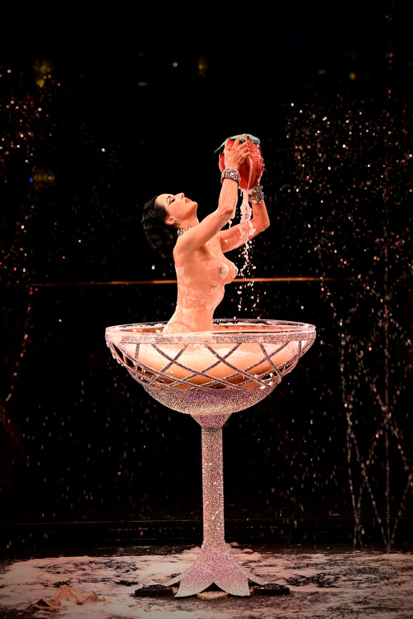 Dita Von Teese performs during the Alexis Mabille Haute Couture Fall/Winter 2024-2025 show as part o…