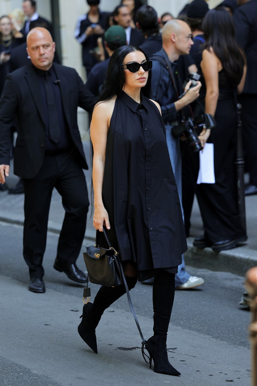 PARIS, FRANCE - JUNE 26: Charli XCX leaves the Balenciaga Haute Couture Fall/Winter 2024-2025 show a...