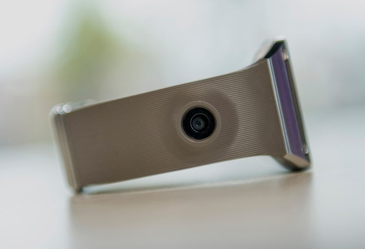 The camera on the Samsung Electronics Co. Galaxy Gear watch is seen in an arranged for a photograph ...