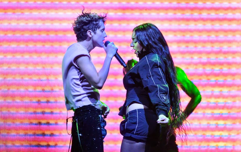 LONDON, ENGLAND - JUNE 27: Charli XCX joins Troye Sivan on stage during the Something to Give Each O...