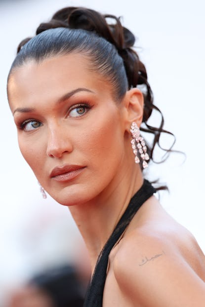 CANNES, FRANCE - MAY 23: Bella Hadid attends the "L'Amour Ouf" (Beating Hearts) Red Carpet at the 77...