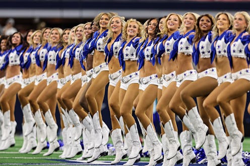 ARLINGTON, TX - JANUARY 14: The Dallas Cowboys Cheerleaders perform during the NFC Wild Card game be...