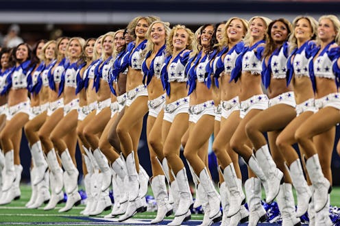 ARLINGTON, TX - JANUARY 14: The Dallas Cowboys Cheerleaders perform during the NFC Wild Card game be...