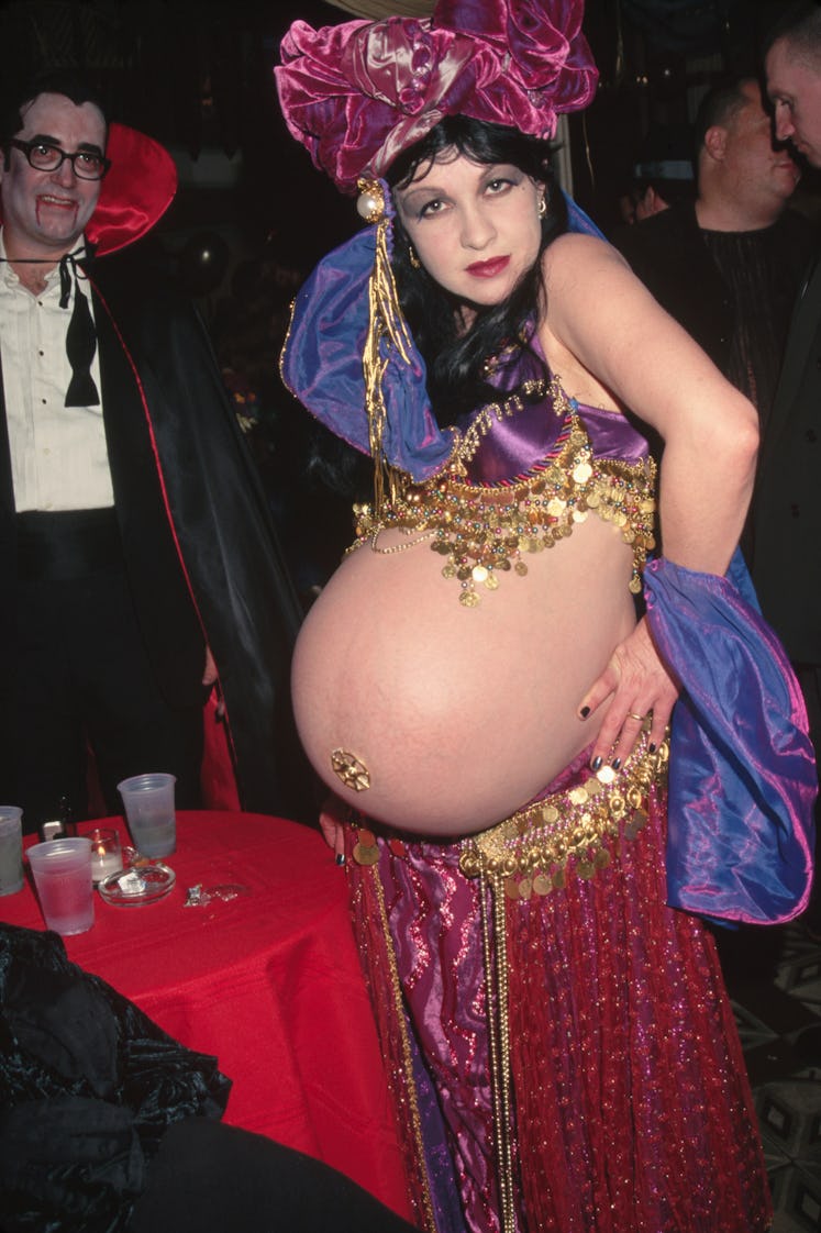  Cyndi Lauper at Howard Kaplan Antiques on Halloween. She is pregnant, wearing a belly dancer costum...