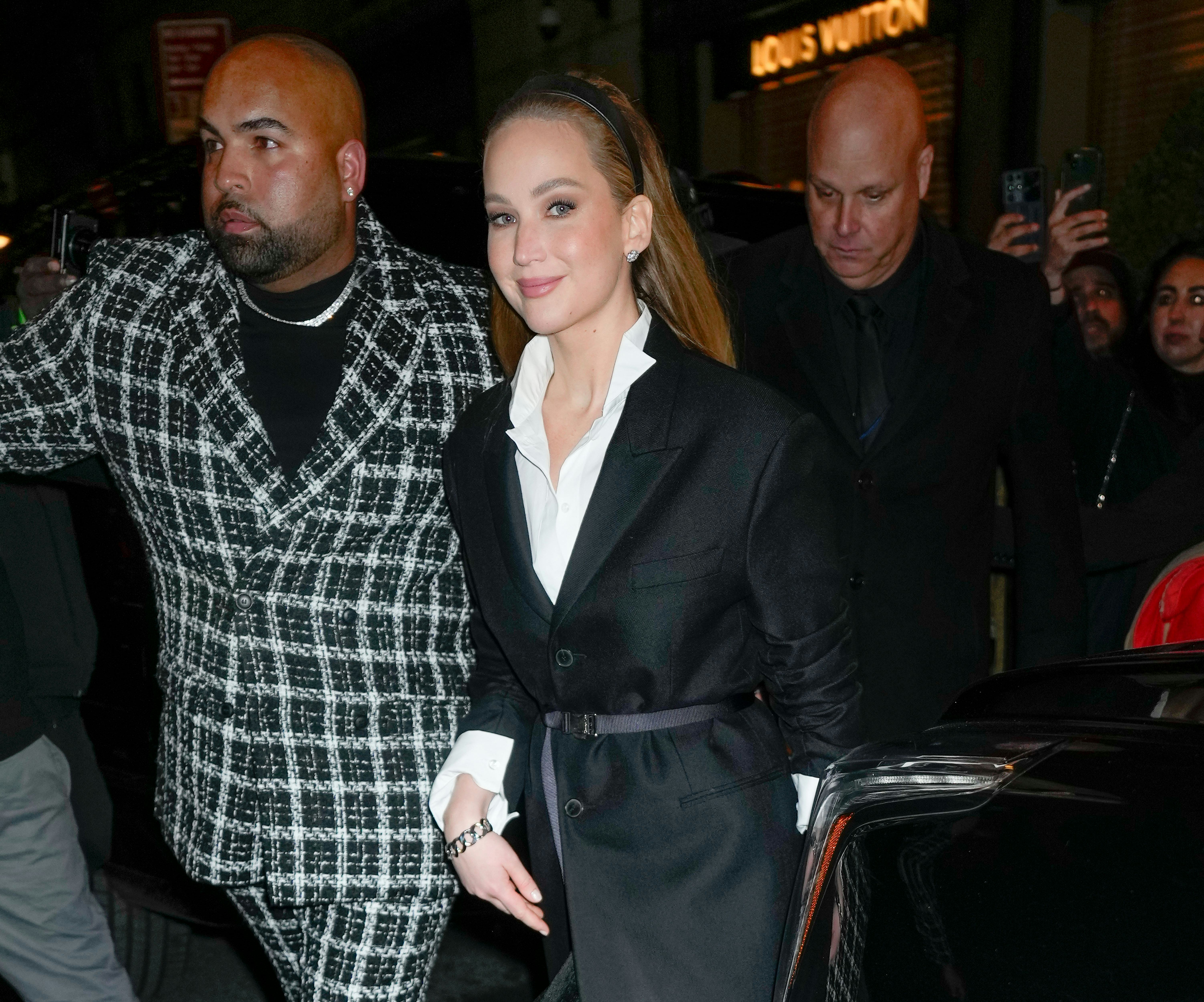 Jennifer Lawrence wears a black and white outfit to attend the Saks - Christian Dior holiday window &hellip;