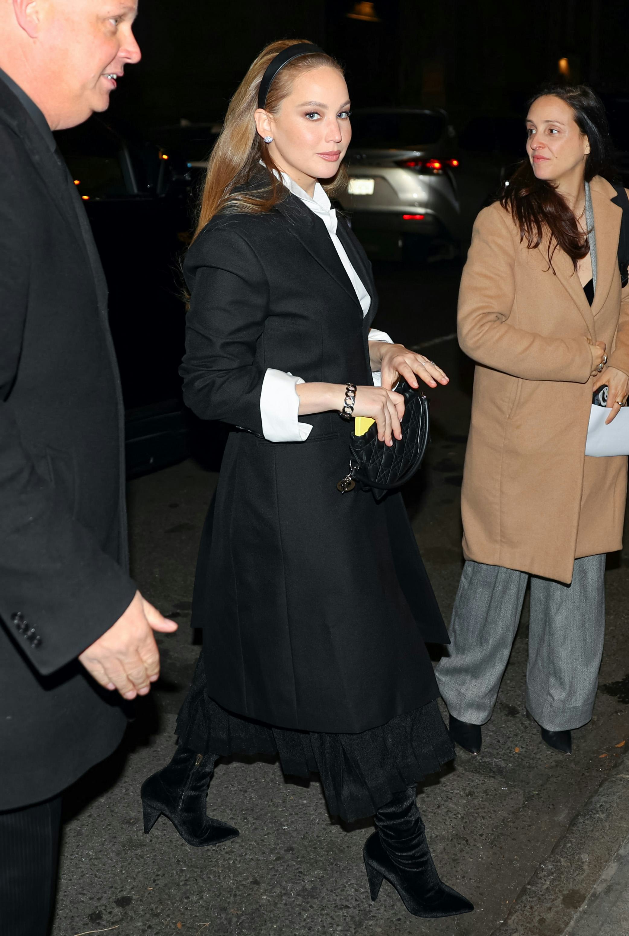 Jennifer Lawrence wears a black and white outfit to attend the Saks - Christian Dior holiday window &hellip;