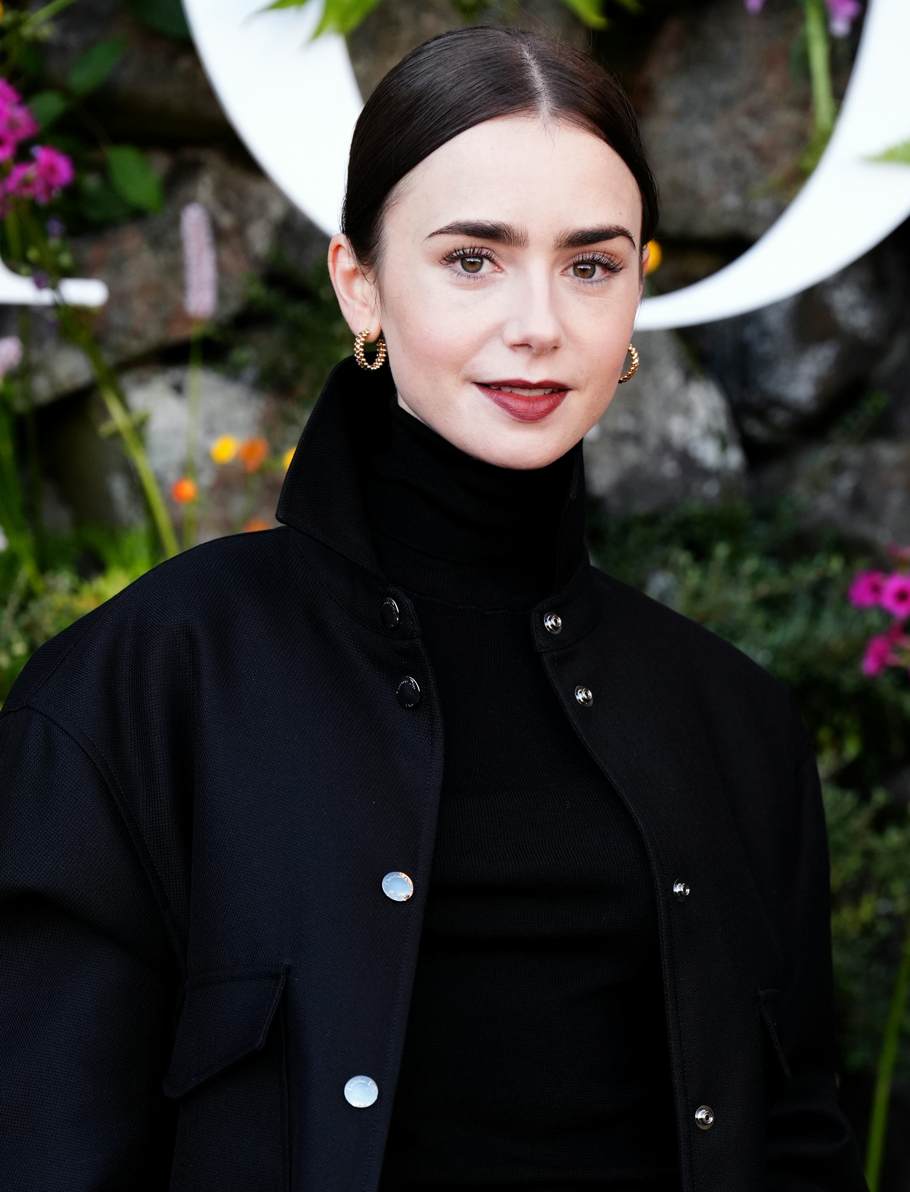 Lily Collins wears an all-black outfit to attend the Dior Cruise 2025 show on June 3, 2024 in Edinbu&hellip;