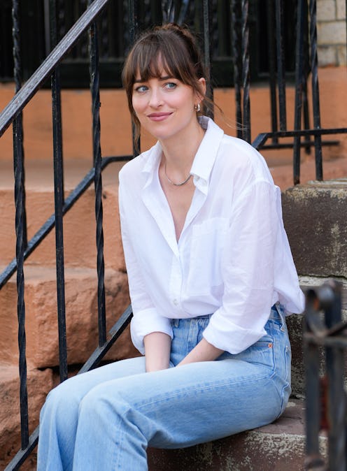 Dakota Johnson jeans and white button up shirt