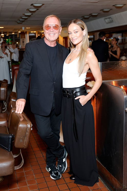 LOS ANGELES, CALIFORNIA - JUNE 04: (L-R) Michael Kors and Olivia Wilde attend as Michael Kors celebr…