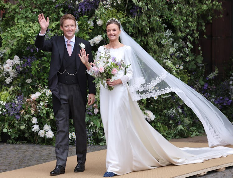 Hugh Grosvenor, Duke of Westminster and Olivia Grosvenor, Duchess of Westminster wave and smile to w...