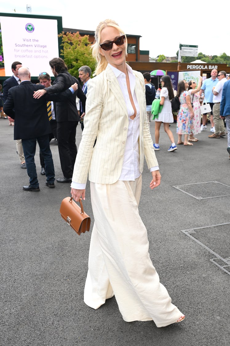 Poppy Delevingne attend day one of the Wimbledon Tennis Championships 