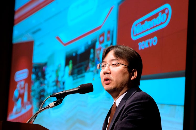 Shuntaro Furukawa, president of Japan's video game company Nintendo, delivers a speech during a brie...
