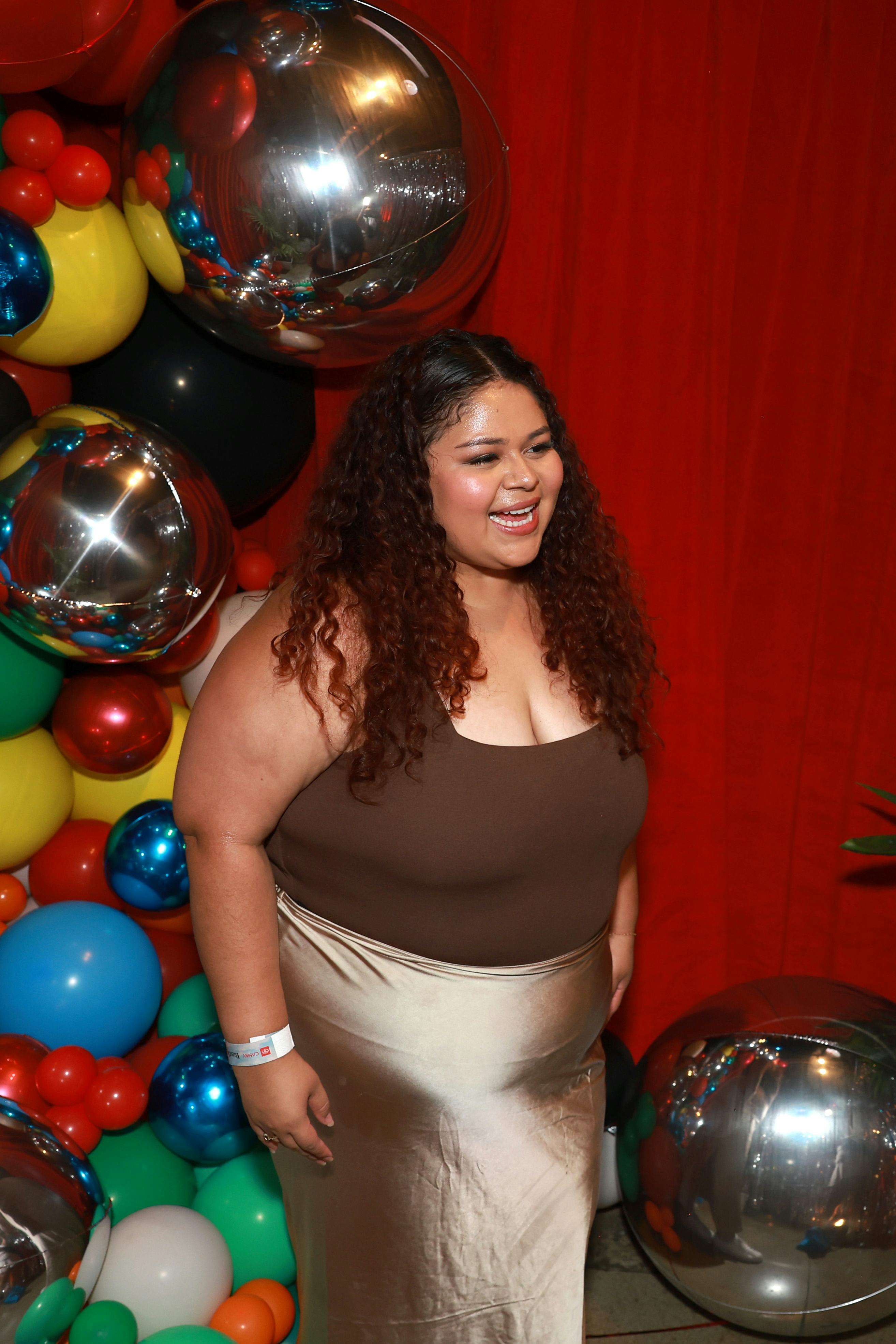 A guest attends the Bustle B.Happy event.