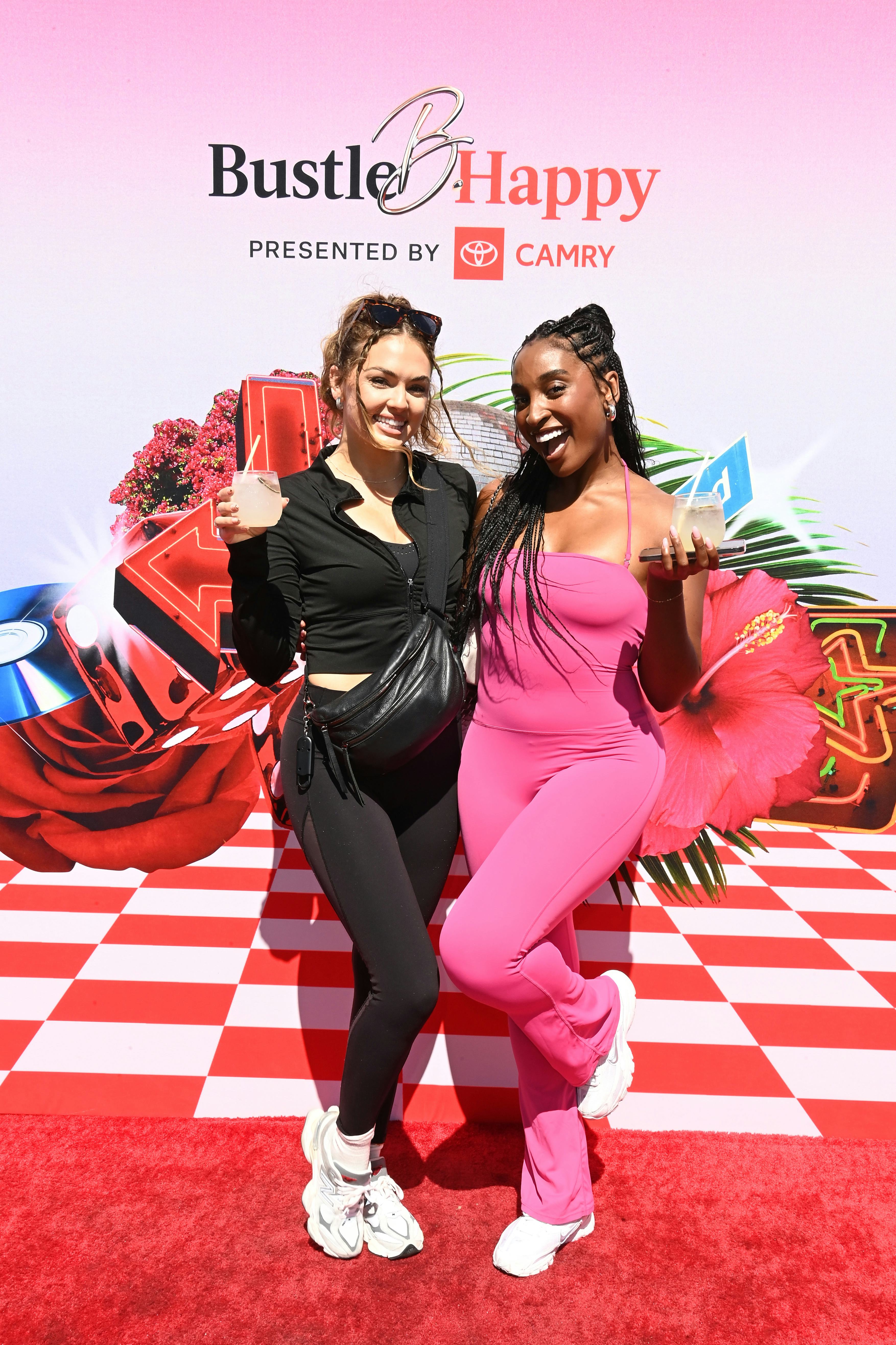 Susie Evans (L) attends Bustle B.Happy event with a friend.