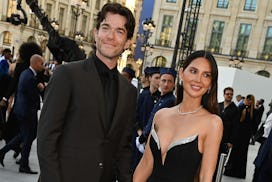 PARIS, FRANCE - JUNE 23: John Mulaney and Olivia Munn attend Vogue World: Paris at Place Vendome on ...