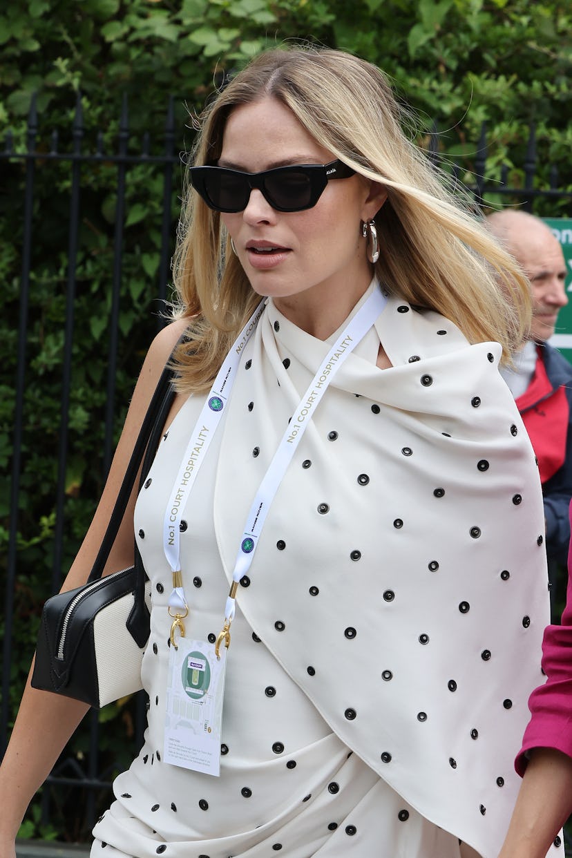 Margot Robbie attends day twelve of the Wimbledon Tennis Championships