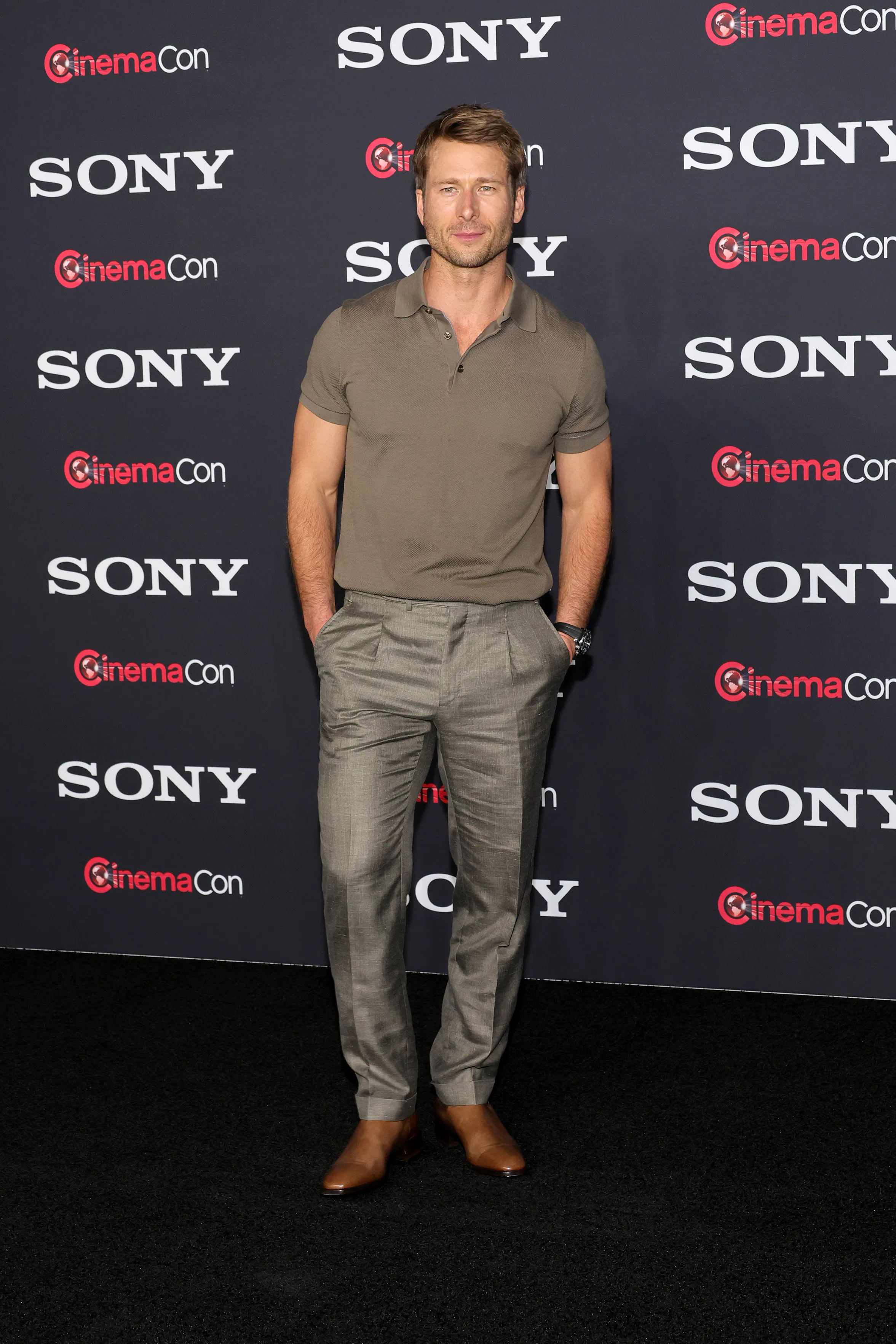 Glen Powell's Dapper Red Carpet Moments Are All About 