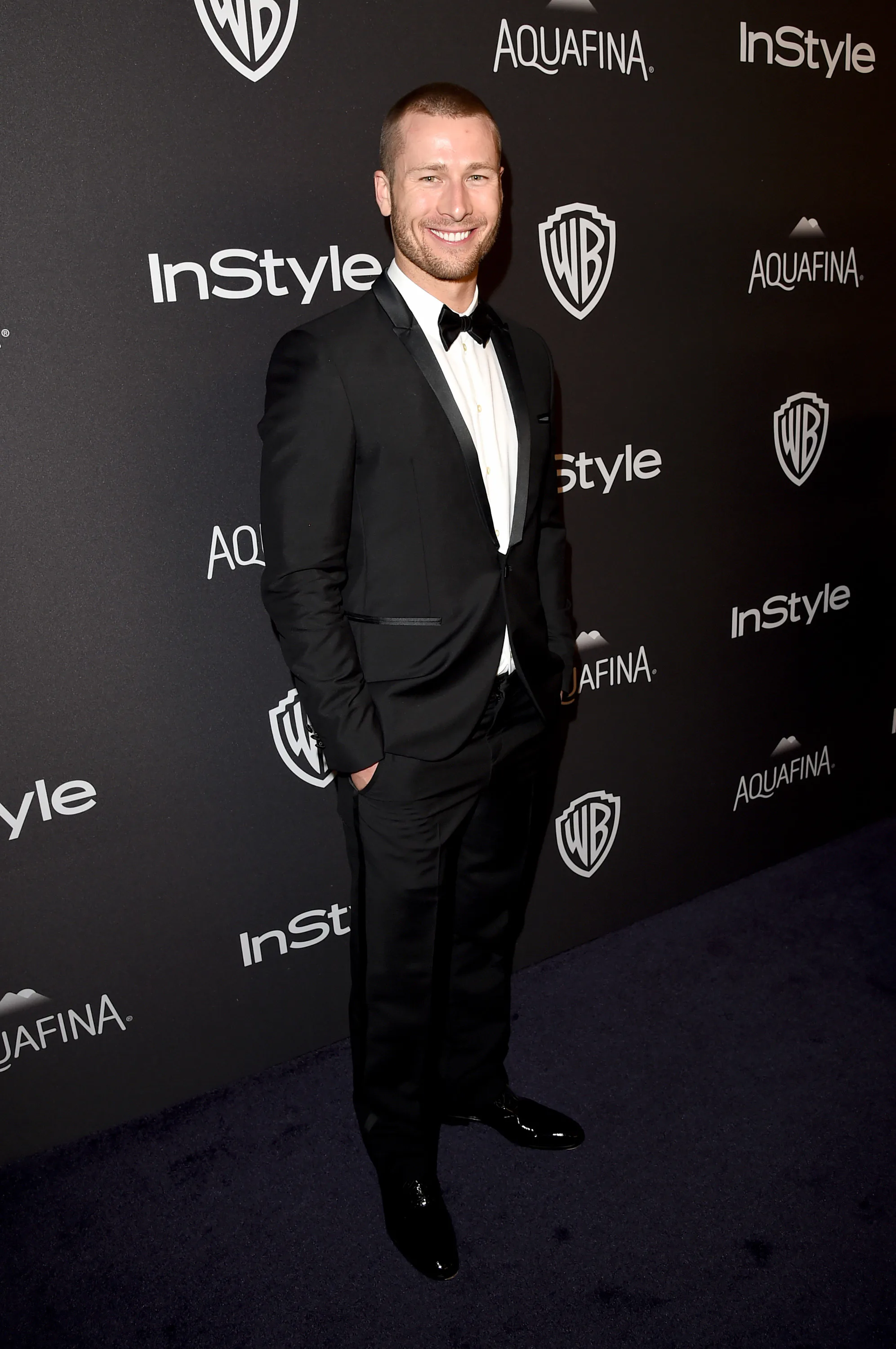 Glen Powell's Dapper Red Carpet Moments Are All About 