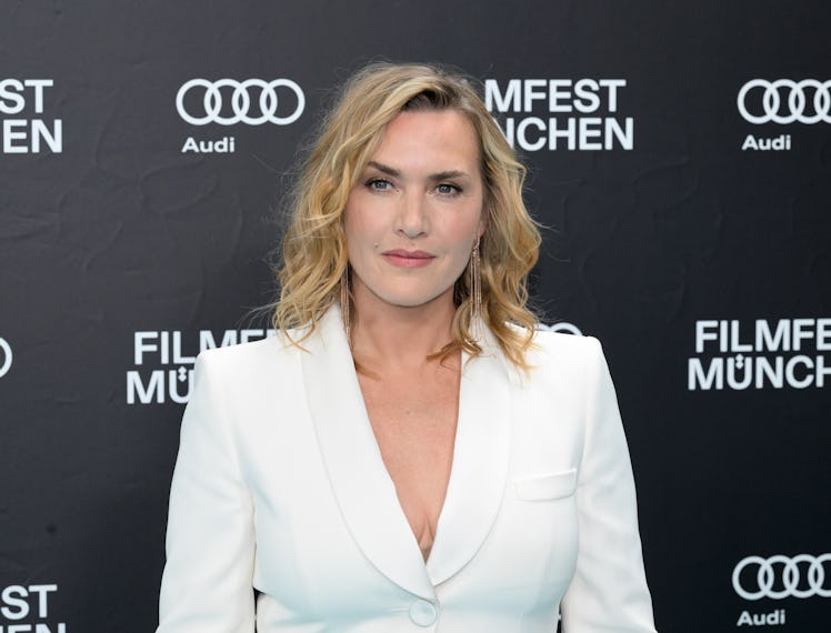 02 July 2024, Bavaria, Munich: Oscar winner Kate Winslet stands on the turquoise carpet at the CineM...