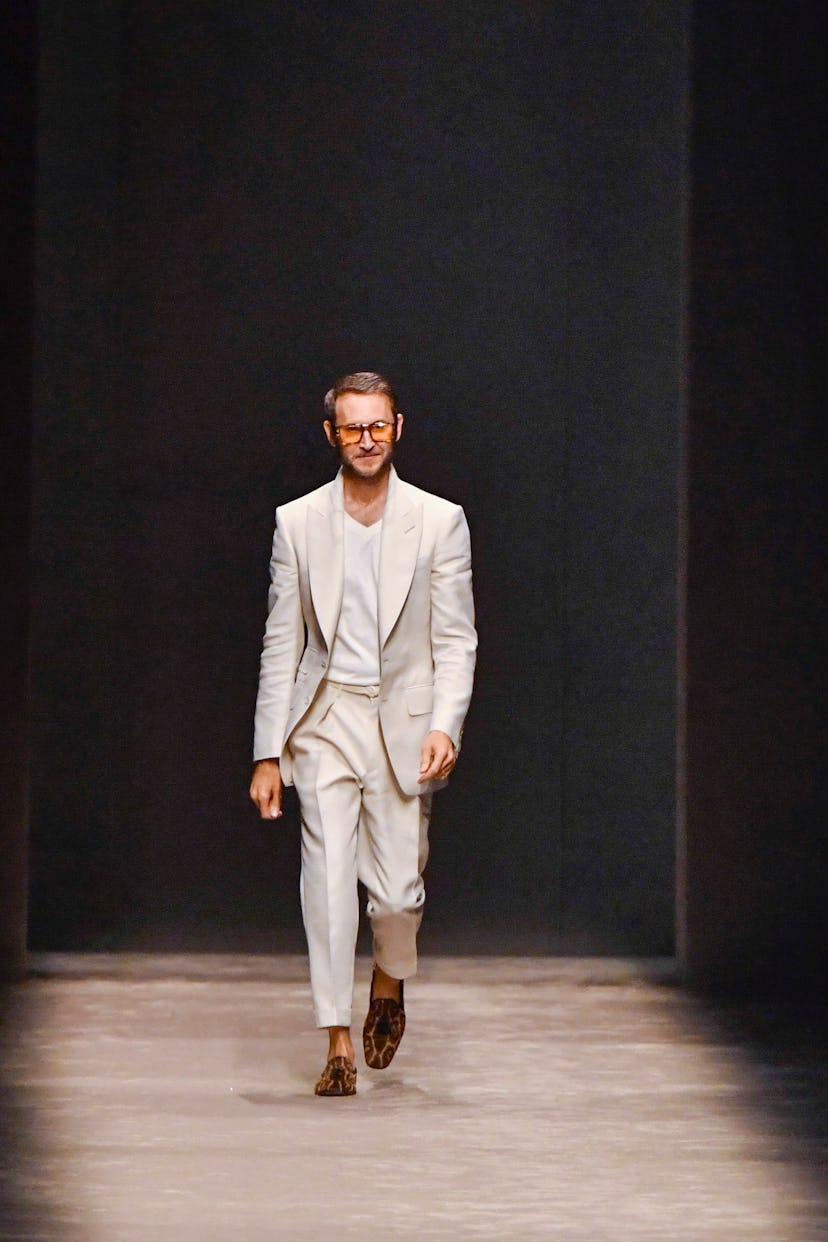 Fashion designer Peter Hawkings walks the runway
