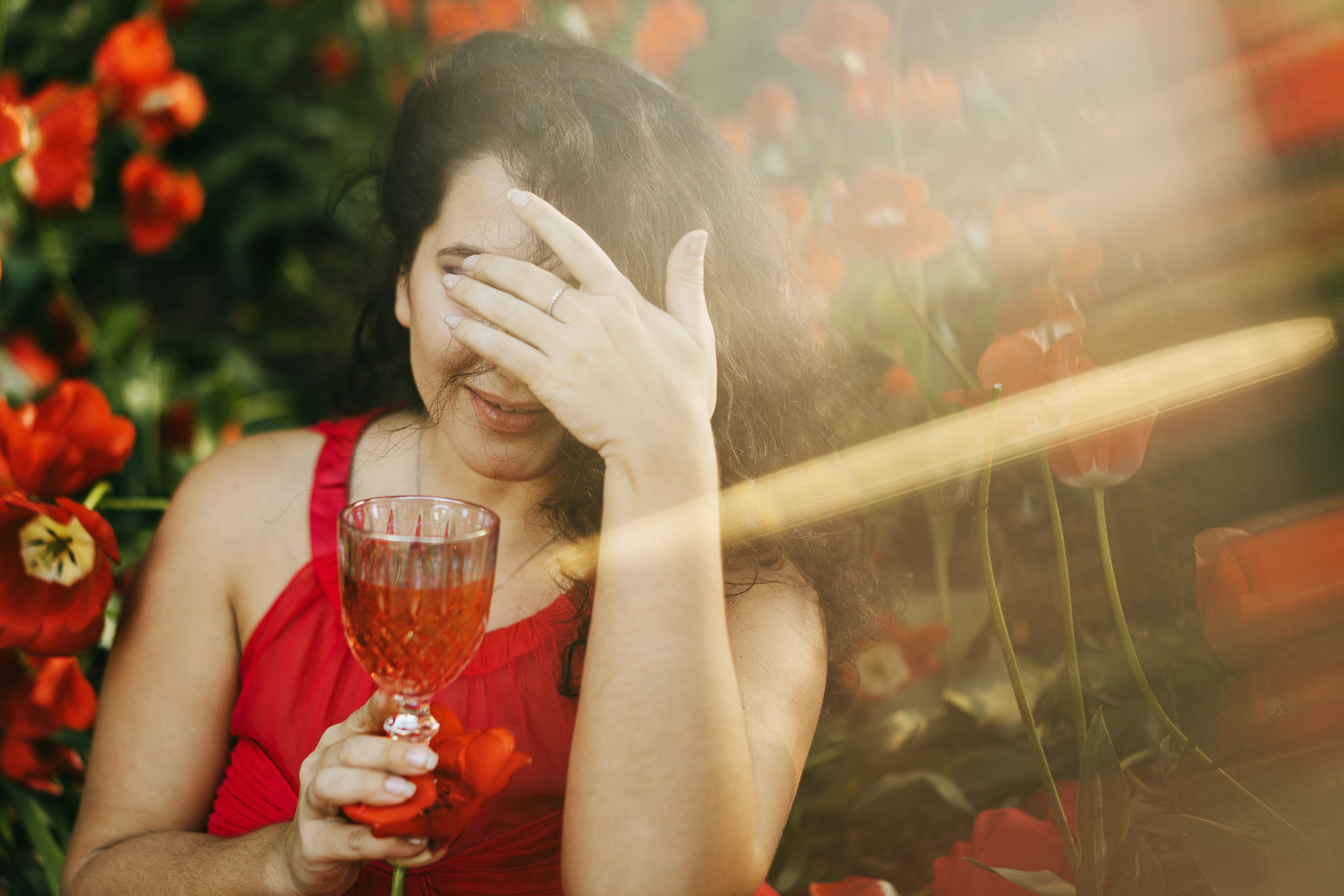 drinking a glass of wine