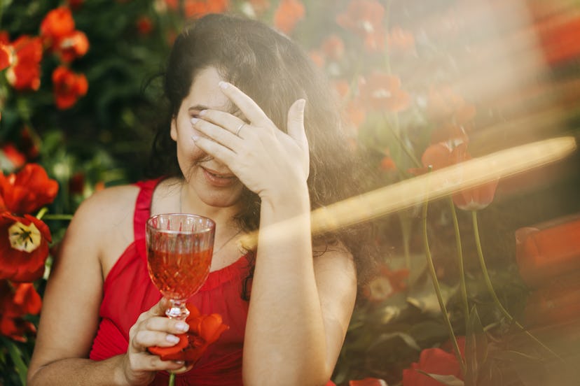 drinking a glass of wine