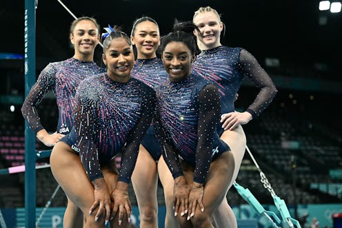 TOPSHOT - (From L to R) US' Hezly Rivera, Jordan Chiles, Sunisa Lee, Simone Biles and Jade Carey pos...