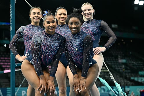 TOPSHOT - (From L to R) US' Hezly Rivera, Jordan Chiles, Sunisa Lee, Simone Biles and Jade Carey pos...