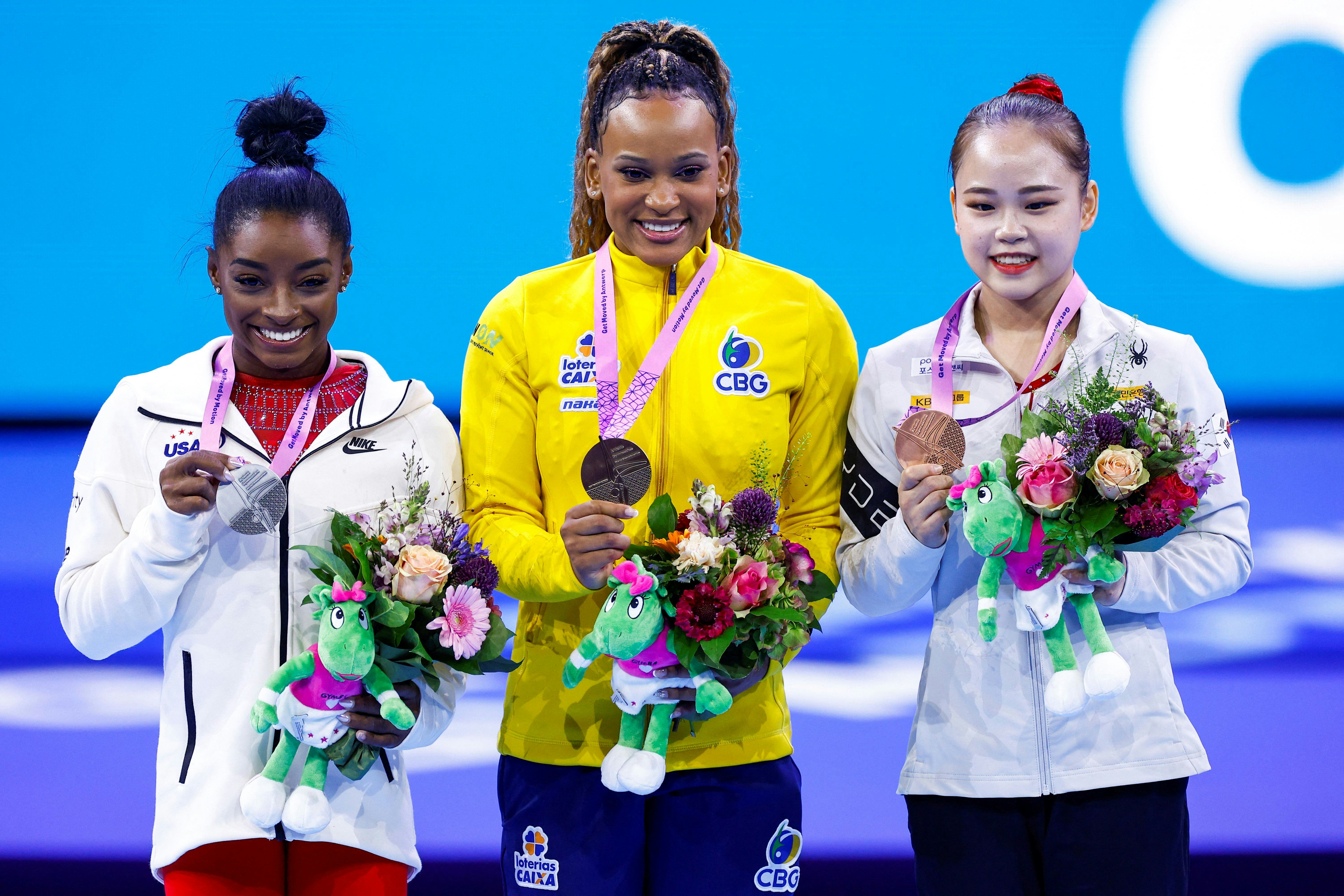(From L) Second-placed US' Simone Biles, winner Brasil&rsquo;s Rebeca Andrade and third-placed Korea&rsquo;s Seo&hellip;