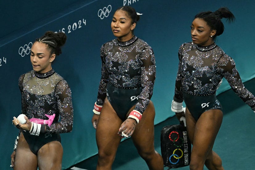 US' Simone Biles (R), US' Jordan Chiles (C) and US' Hezly Rivera arrive to compete in the artistic g…