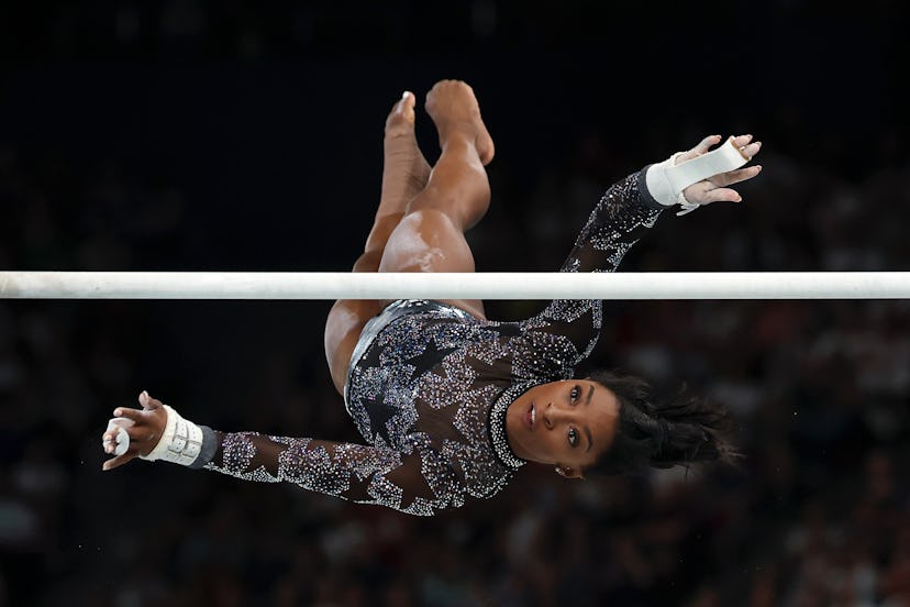 Simone Biles of Team USA competes on the uneven bars.