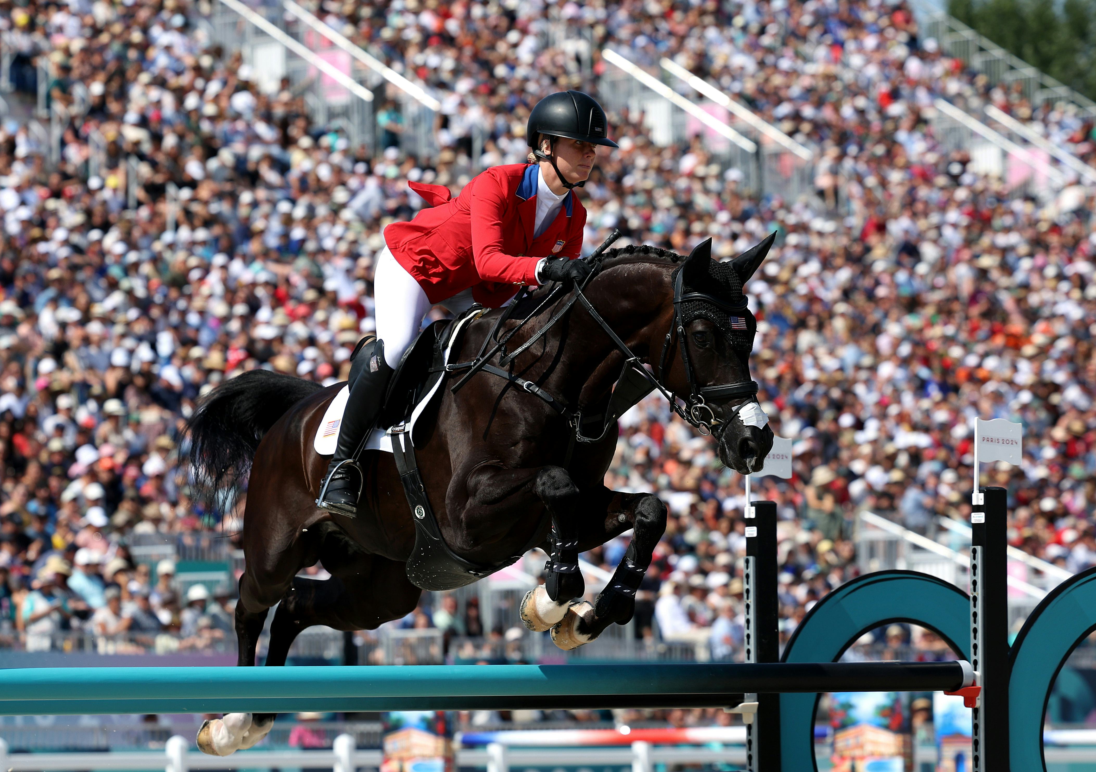 Caroline Pamukcu and horse HSH Blake.