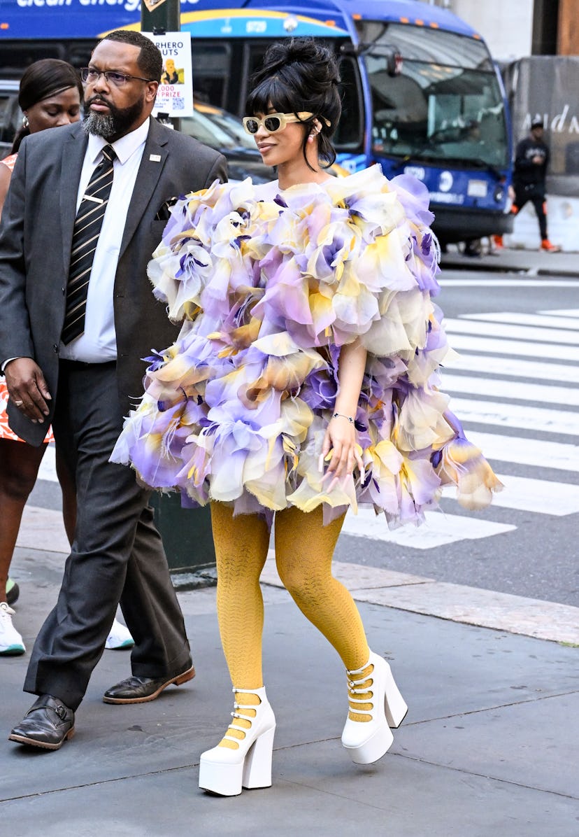 Cardi B wears a floral mini to attend the Marc Jacobs fashion show at the New York Public Library on...