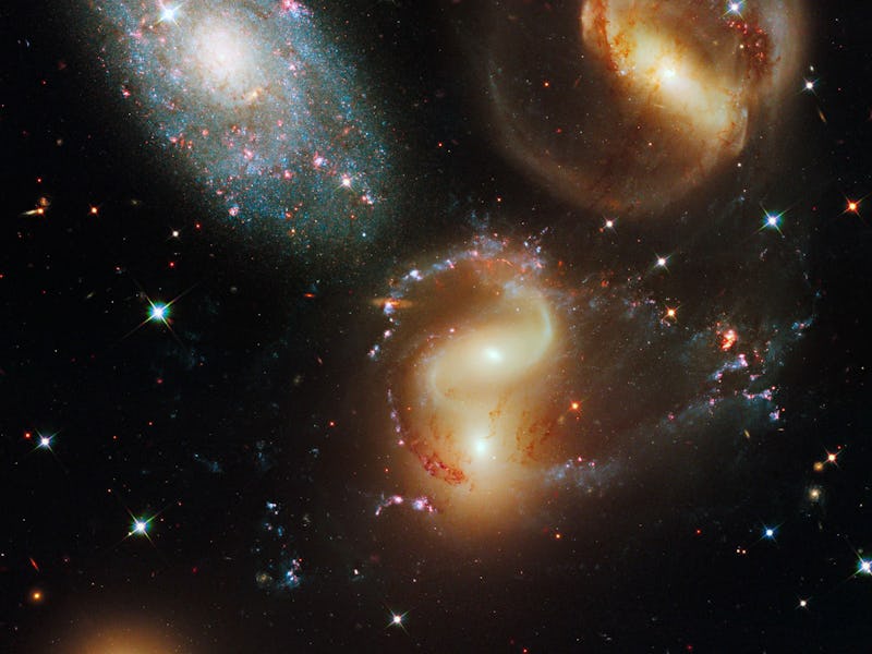 This portrait of StephanG¦+s Quintet, also known as Hickson Compact Group 92, was taken by the new W...