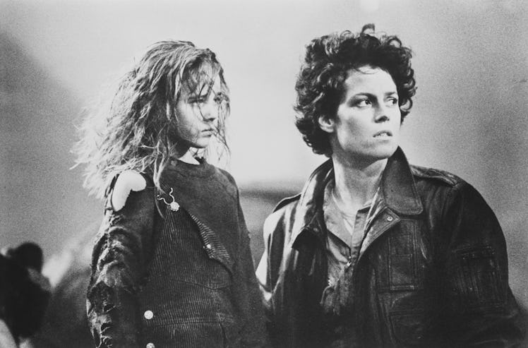 American actresses Sigourney Weaver and Carrie Henn on the set of the film Aliens II, directed by Ja...