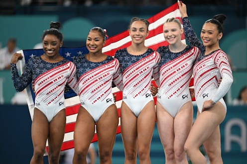 Simone Biles from the USA and the team celebrate gold in leotards with 10,000 Swarovski crystals.